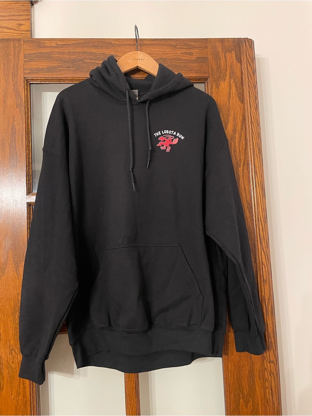 Black Hoodie with Red Lobster Graphic